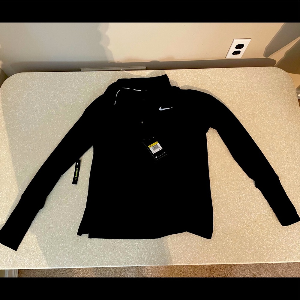 NWT Women’s small NIKE long sleeve dri fit shirt